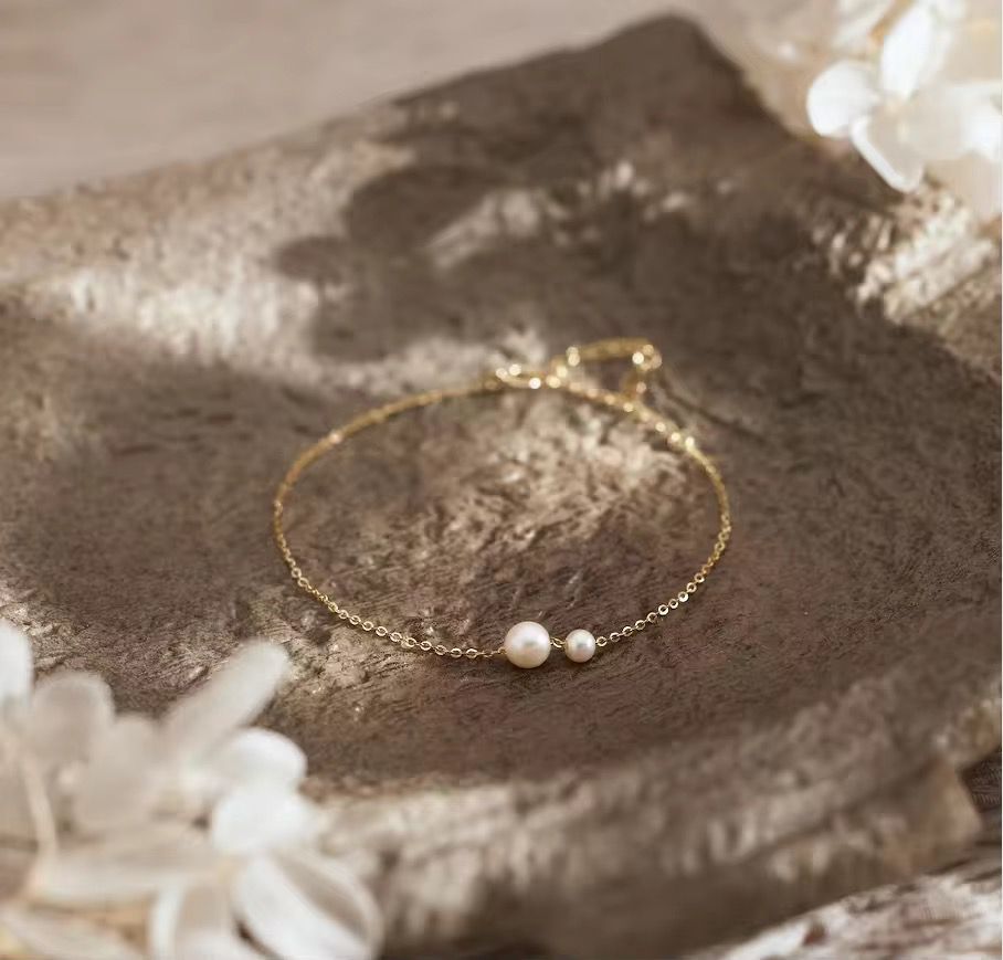 Swastik Pearl Elegance Bracelet